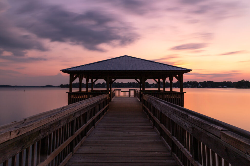 Living in Lake Norman Made Easy Fishing pier at Ramsey Creek Park in Cornelius, North Carolina overlooking Lake Norman.