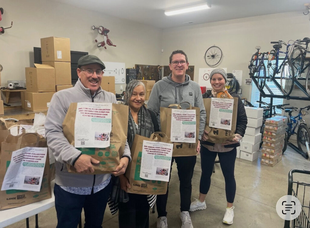 Kay Fisher and volunteers at Neighborhood Care Center food drive — Cornelius NC community impact