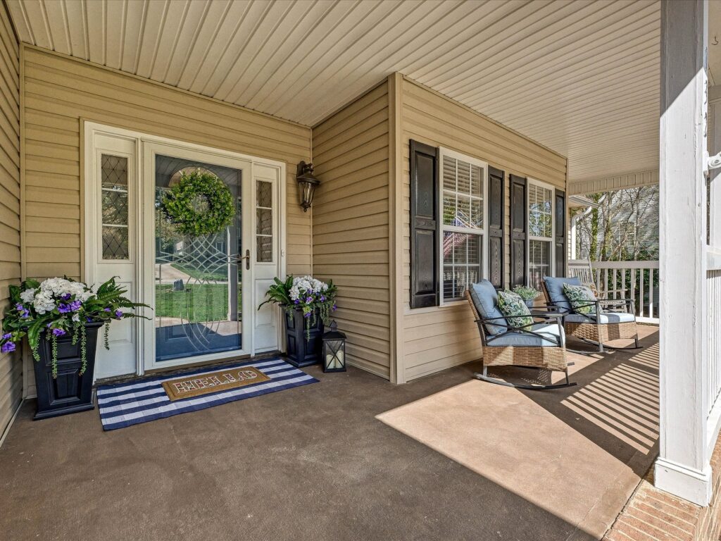 Rocking chair front porch with columns at 132 Gray Cliff Drive Mooresville NC