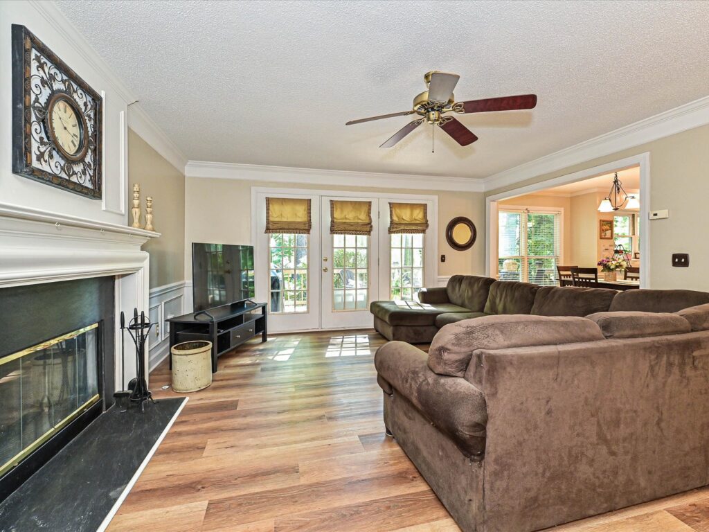 Family room with fireplace and access to the back deck